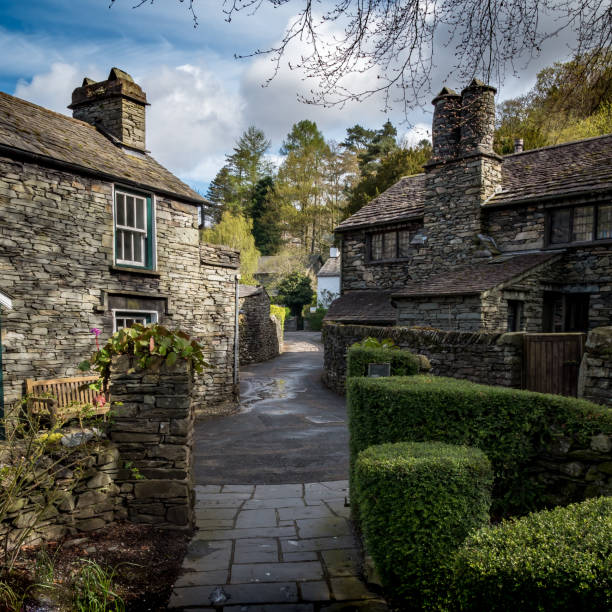 Grasmere cottages, Lake District, Cumbria, England Traditional cottages in the quaint English Lake District town of Grasmere on an overcast spring morning. grasmere stock pictures, royalty-free photos & images