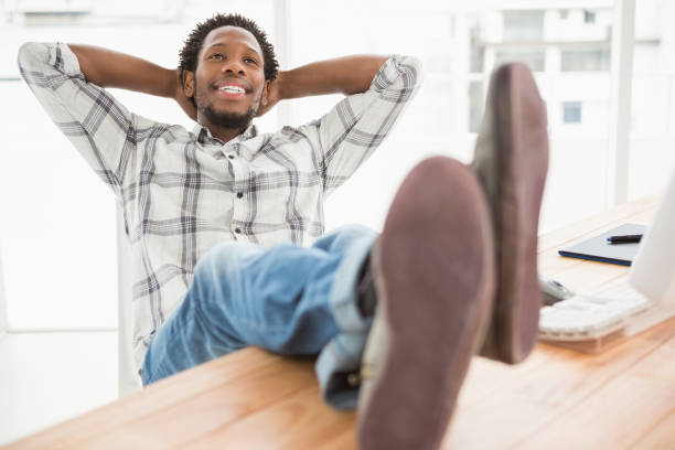 istock Cheerful businessman relaxing 692840840