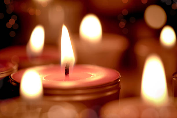 istock Retro candle light with soft light background in the Church - Prayer and hope concep 692841136