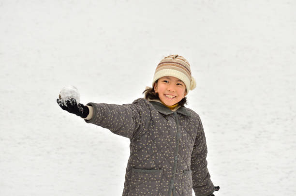 Girl enjoying snow play