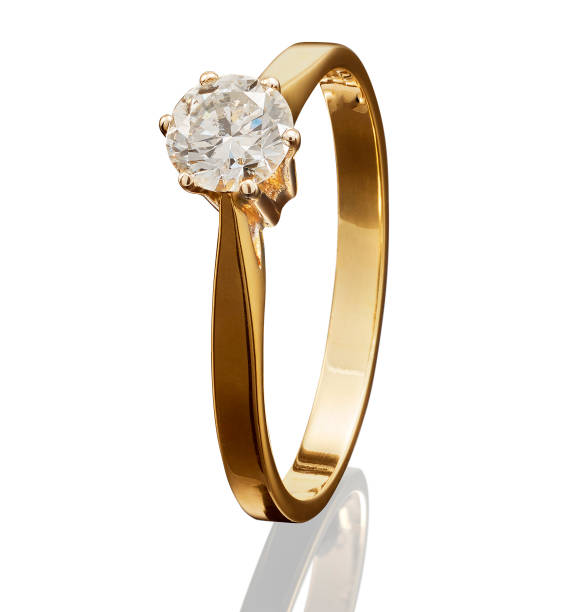 istock Golden ring with gemstone isolated on white background 692845480