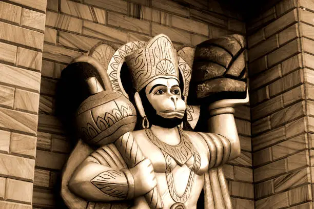 Hindu God jai hanuman statue in sepia toned.