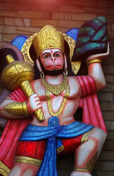 Hindu God jai hanuman statue, hanuman is carrying mountains in his hands.