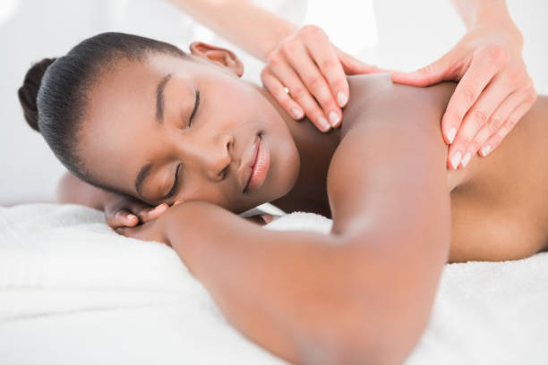 istock Pretty woman enjoying a massage 692851678