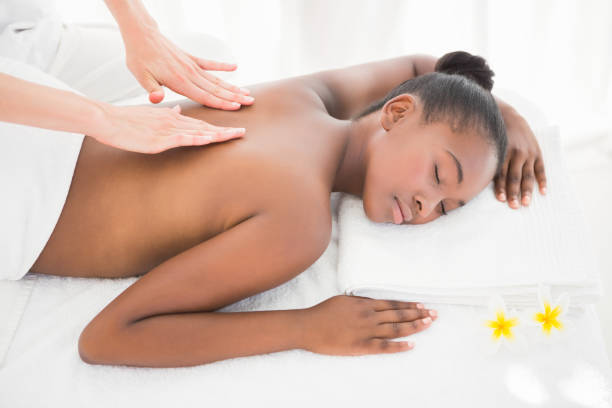 istock Pretty woman enjoying a massage 692852316