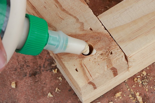 Assembling furniture by dowel joint