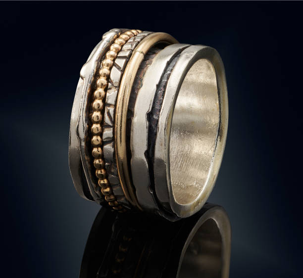 istock beautiful Golden ring isolated on black background 692852616