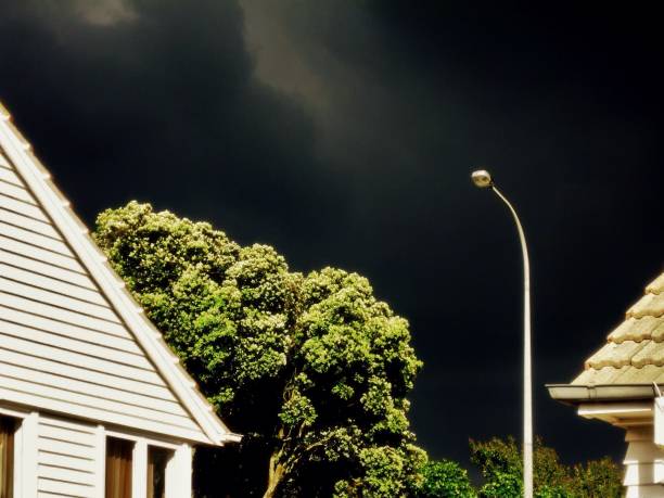 istock Black Stormy Clouds Urban Landscape 692859448