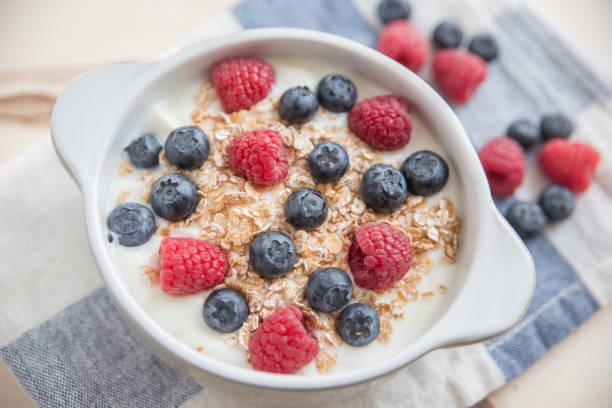 istock Muesli with yogurt and fruits 692862546