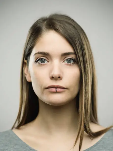 Photo of Real young woman studio portrait