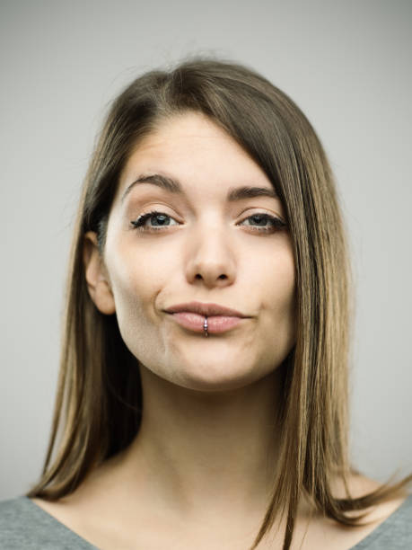 portrait of a confident real young woman - smug imagens e fotografias de stock