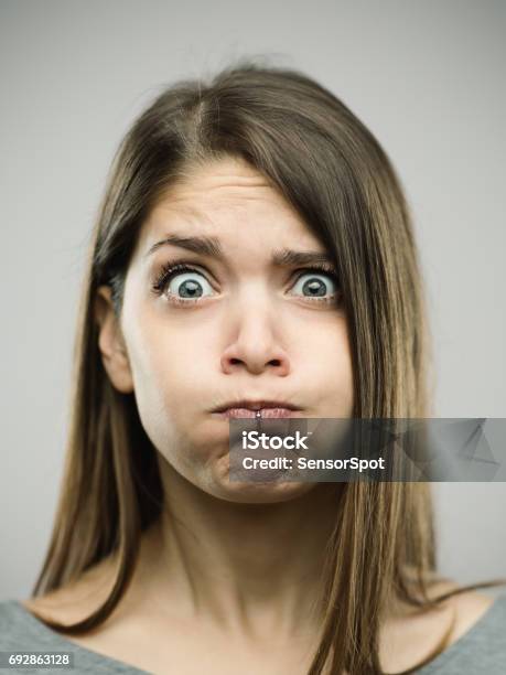 Real Young Woman With Disgust Expression Stock Photo - Download Image Now - Holding Breath, Women, Nausea
