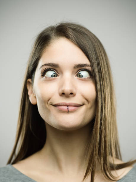 istock Real young woman with crossed eyes 692863198