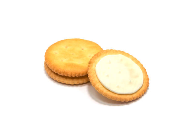 Cracker cookies cream on white background. Cracker cookies cream on white background. biscuit quick bread photos stock pictures, royalty-free photos & images