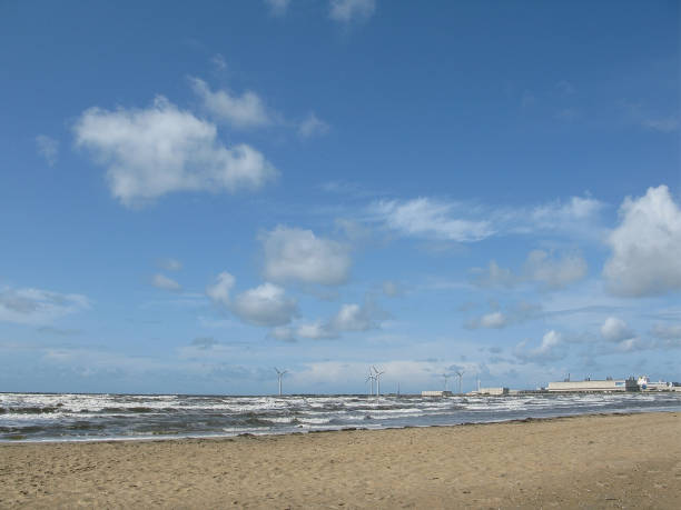 sandy beach at skrea strand on a windy and sunny day with dark clouds in falkenberg, sweden. - 2333 imagens e fotografias de stock