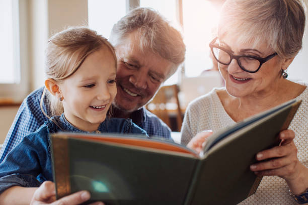 istock Grandparents reading a fairytail 692869938