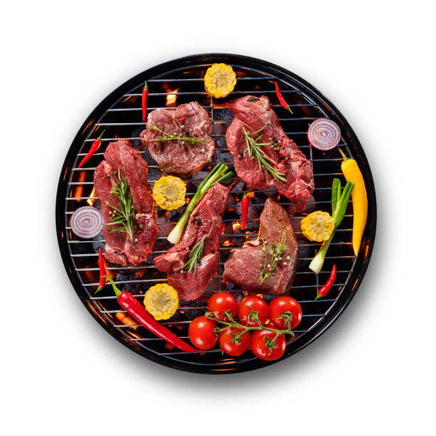 istock Fresh raw beef steaks placed on grill, isolated on white background 692873066