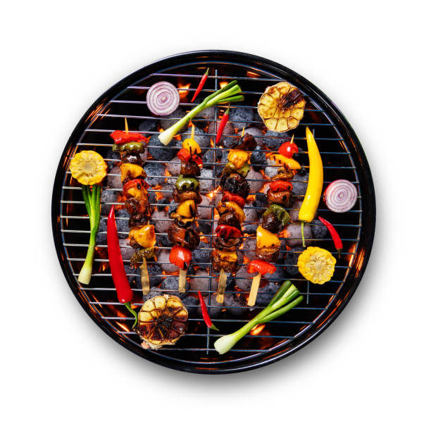 istock Fresh skewers placed on grill, isolated on white background 692873152
