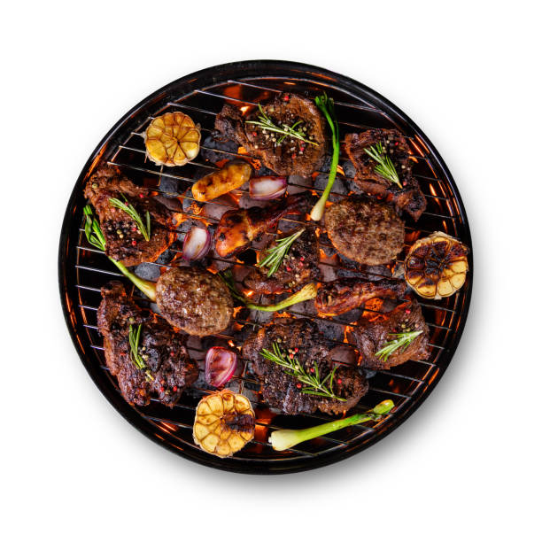 istock Many kinds of meat placed on grill, isolated on white background 692873194