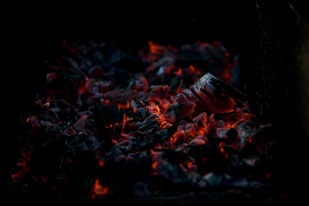 istock Smouldering coals at barbeque campfire 692873422
