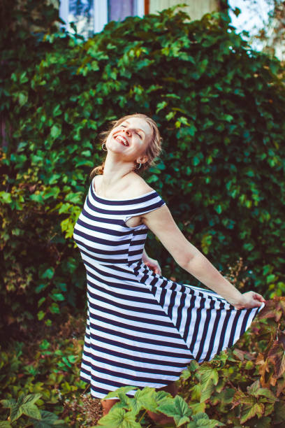 istock Woman in the summer garden 692873718
