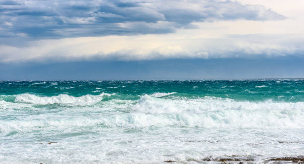 istock Strong wind, sea waves and the coast or beach. 692876680