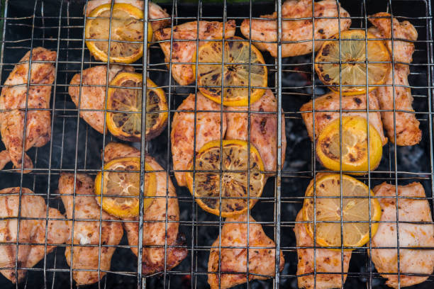 Grilled chicken breast on barbeque