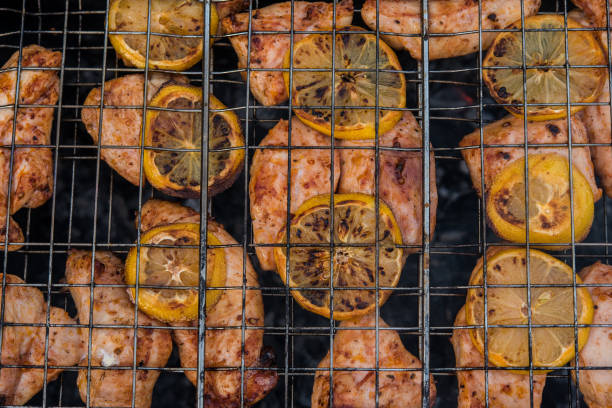 Grilled chicken breast on barbeque