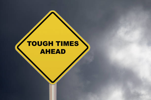 istock Crossing Sign - Tough times Ahead 692883174