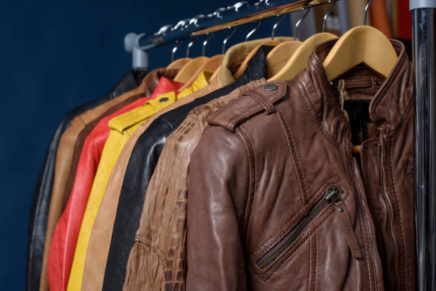 istock Different color leather jacket hanging on rack 692886886