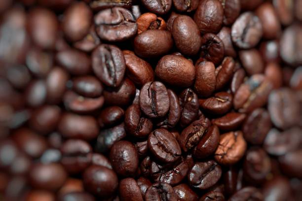 istock Closeup of coffee beans background 692887438