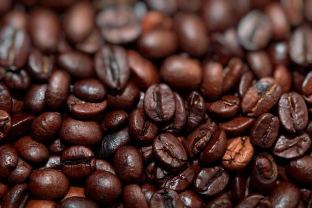 istock Closeup of coffee beans background 692887448
