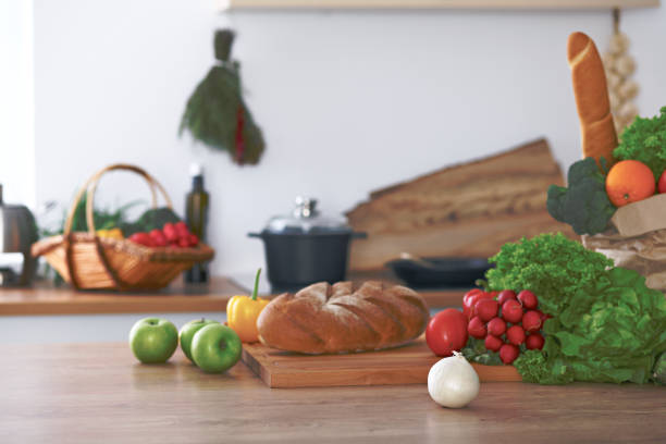 istock Kitchen interiors. Many vegetables and other meal are ready for been cooked soon 692888106