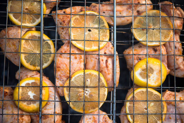 Grilled chicken breast on barbeque