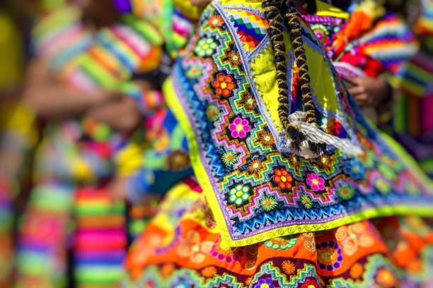 istock Peruvian dancers at the parade in Cusco. People in traditional clothes. 692891964