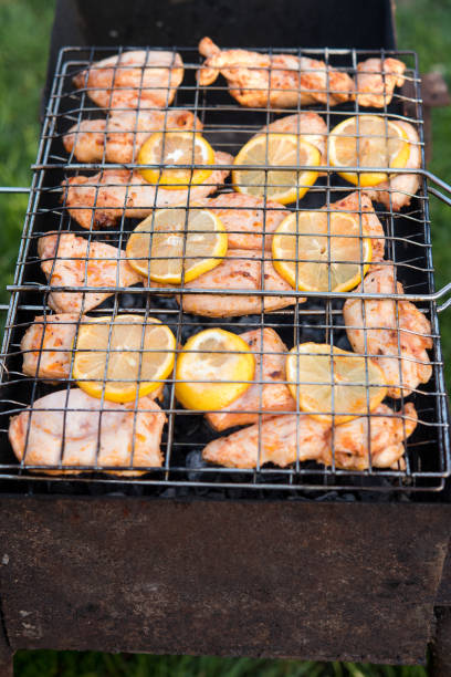 Grilled chicken breast on barbeque