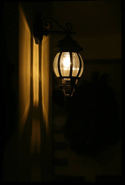 istock Street lantern on a black background 692897130