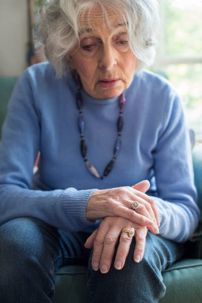 istock Senior Woman Suffering With Parkinsons Diesease 692902098