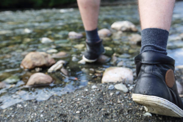 istock Man hiking outdoor near river 692904426