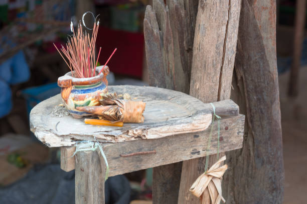 istock Burned red Incense stick in old joss-stick pot 692908006