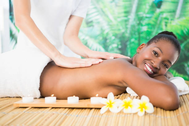istock Pretty woman enjoying a massage 692908220