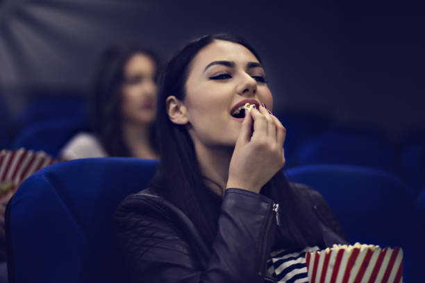istock Friends Having Nice Time At Cinema 692908252