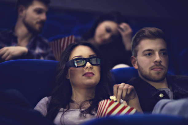 istock Friends Having Nice Time At Cinema 692908516