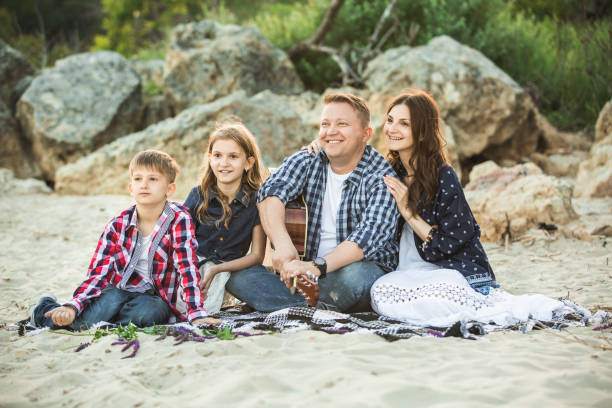 istock Family on the beach. 692910180