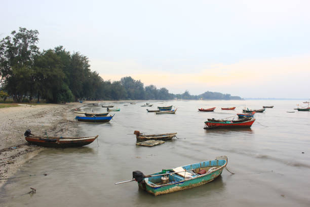 istock Old fishing boat on the beach 692918818