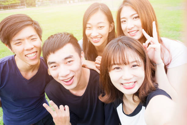 istock Group of happy friends taking a selfie 692927134