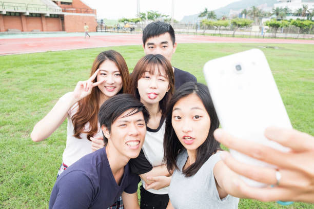 istock Group of happy friends taking a selfie 692927602