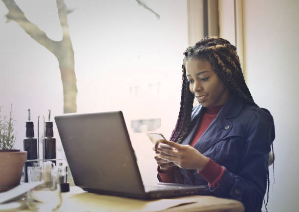 istock Afro girl in a bar 692930640