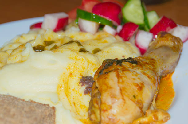 istock mashed potatoes fried Kura and vegetables in dinner plate closeup 692931924