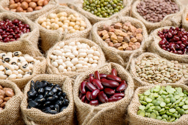 istock Various multicolor dry legumes in a sack cloth 692936744